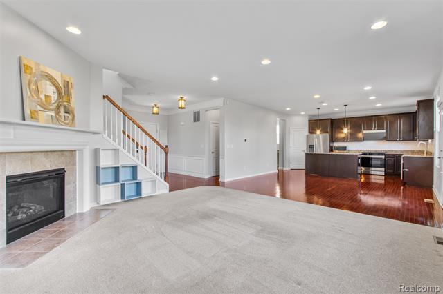 Builiding view eleven for 57570 Village, New Hudson, MI. 48165