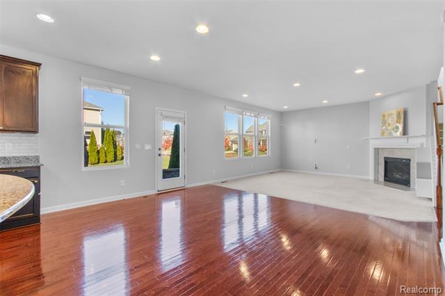 Builiding view fifteen for 57570 Village, New Hudson, MI. 48165