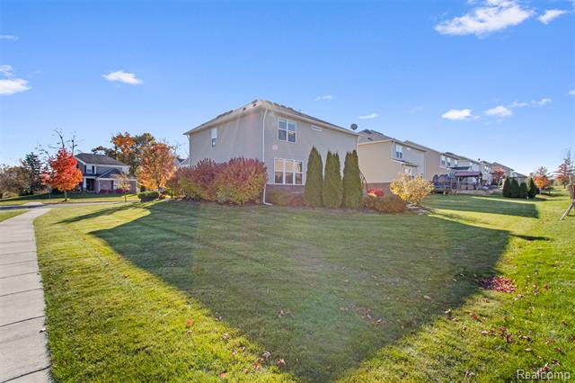 Builiding view forty one for 57570 Village, New Hudson, MI. 48165