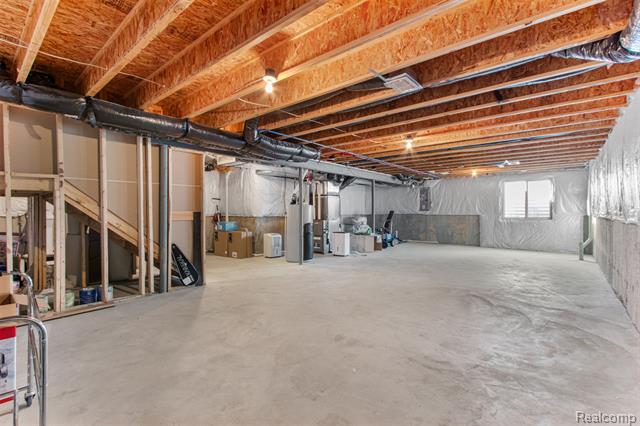 Builiding view forty for 57570 Village, New Hudson, MI. 48165