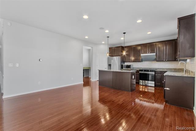 Builiding view fourteen for 57570 Village, New Hudson, MI. 48165