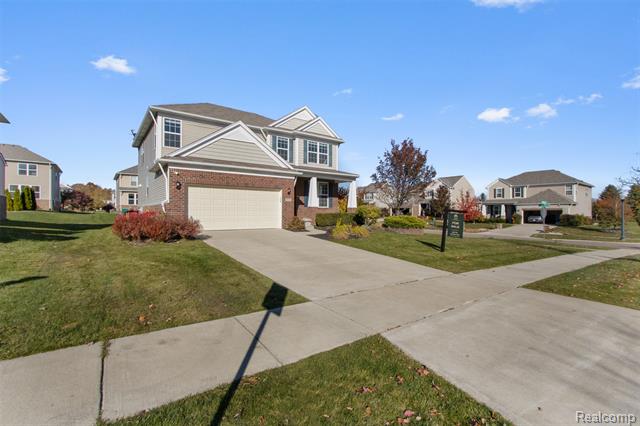 Builiding view one for 57570 Village, New Hudson, MI. 48165