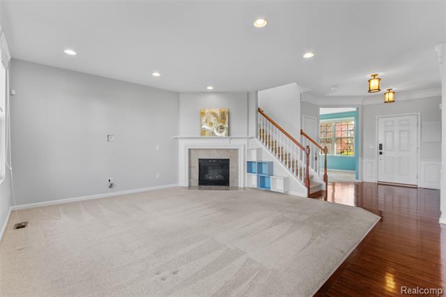 Builiding view ten for 57570 Village, New Hudson, MI. 48165