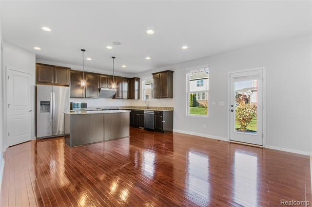 Builiding view thirteen for 57570 Village, New Hudson, MI. 48165