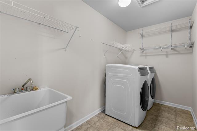 Builiding view thirty four for 57570 Village, New Hudson, MI. 48165