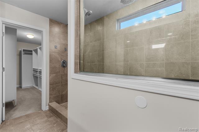 Builiding view thirty one for 57570 Village, New Hudson, MI. 48165