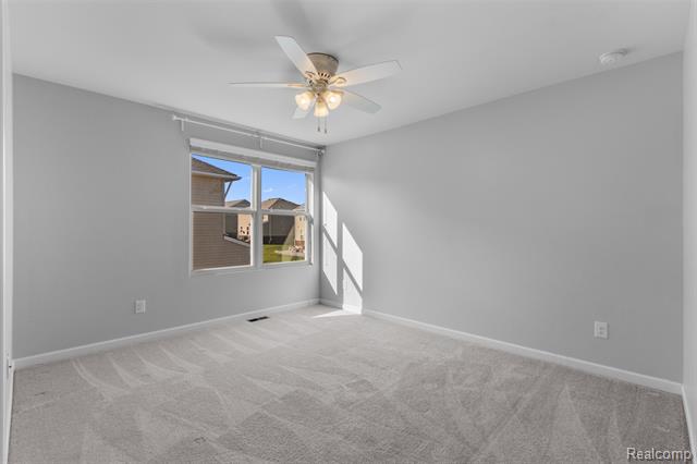 Builiding view thirty seven for 57570 Village, New Hudson, MI. 48165