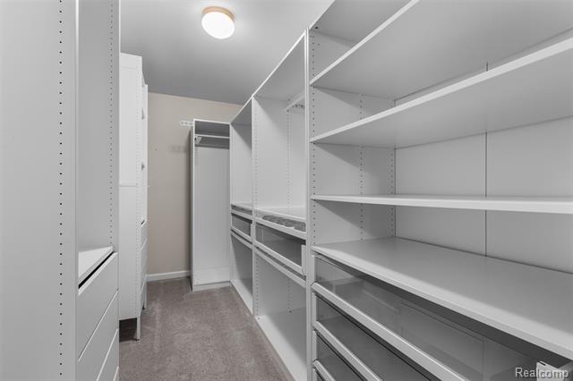 Builiding view thirty two for 57570 Village, New Hudson, MI. 48165