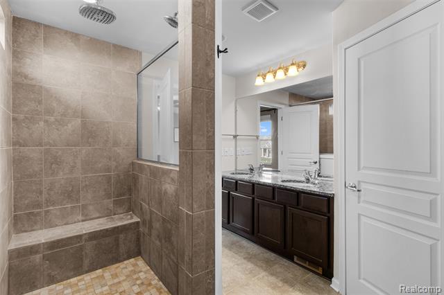 Builiding view thirty for 57570 Village, New Hudson, MI. 48165