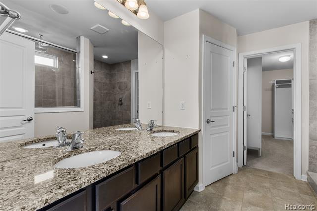 Builiding view twenty eight for 57570 Village, New Hudson, MI. 48165