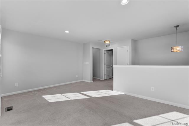 Builiding view twenty four for 57570 Village, New Hudson, MI. 48165