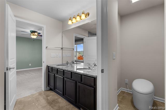 Builiding view twenty nine for 57570 Village, New Hudson, MI. 48165