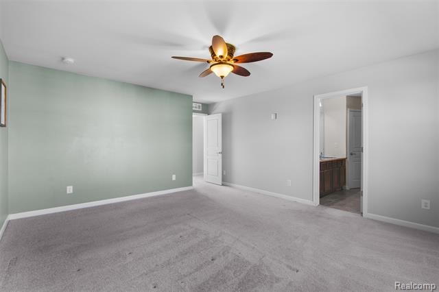 Builiding view twenty seven for 57570 Village, New Hudson, MI. 48165