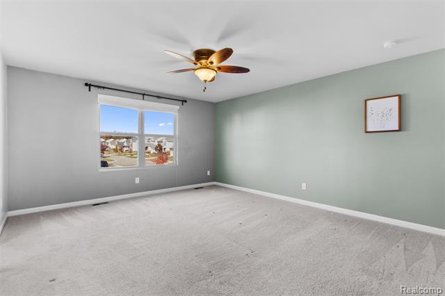 Builiding view twenty six for 57570 Village, New Hudson, MI. 48165