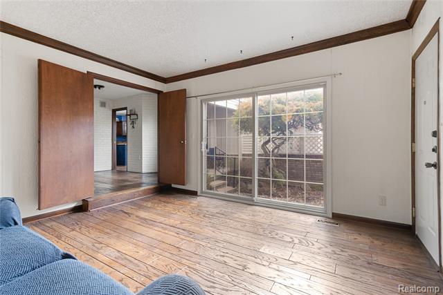 Builiding view sixteen for 6906 Pebblecreek Woods, West Bloomfield, MI. 48322