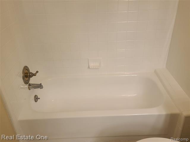 Builiding view seventeen for 38872 Country, Farmington, MI. 48331