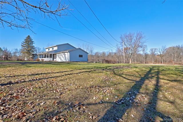 Builiding view fifty five for 3092 Groveland, Ortonville, MI. 48462