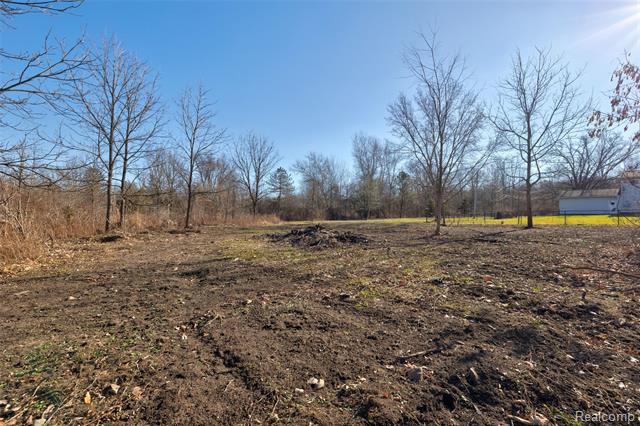 Builiding view fifty nine for 3092 Groveland, Ortonville, MI. 48462