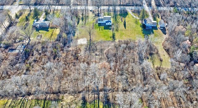 Builiding view forty six for 3092 Groveland, Ortonville, MI. 48462