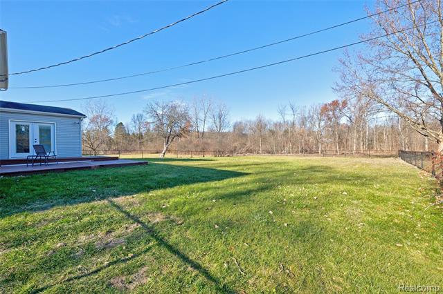 Builiding view sixty seven for 3092 Groveland, Ortonville, MI. 48462