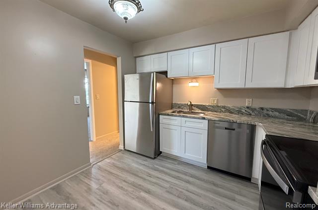 Builiding view twelve for 30709 Shiawassee # 65, Farmington, MI. 48336