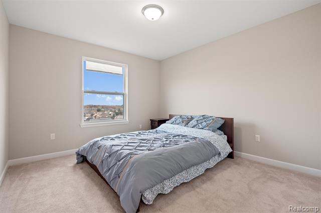 Builiding view thirty for 4882 E Stonegate, Lake Orion, MI. 48359