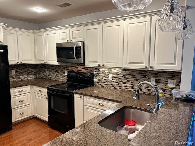 Builiding view three for 323 Countryside, Highland, MI. 48357