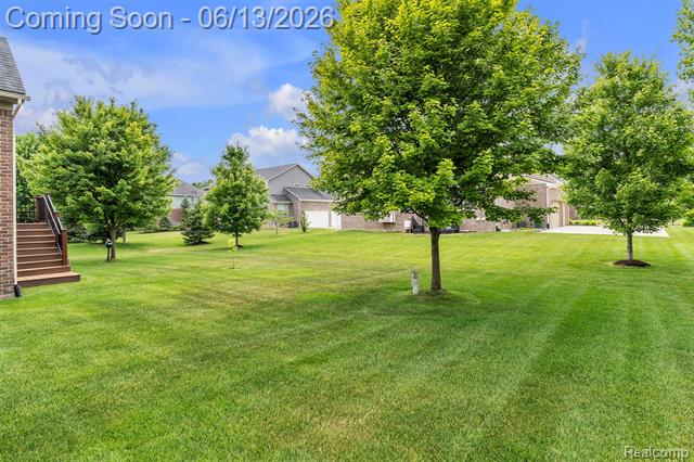 Builiding view sixty for 23719 Stoneleigh, South Lyon, MI. 48178