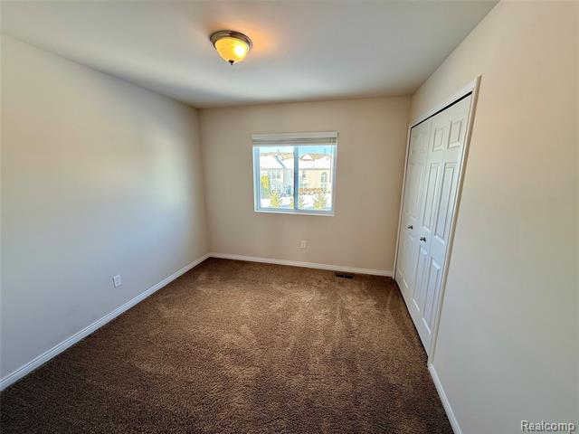 Builiding view eighteen for 327 Hidden River East, Holly, MI. 48442