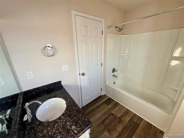 Builiding view nineteen for 327 Hidden River East, Holly, MI. 48442