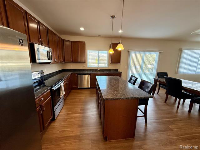 Builiding view six for 327 Hidden River East, Holly, MI. 48442