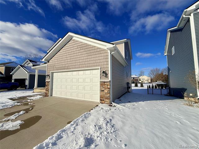 Builiding view two for 327 Hidden River East, Holly, MI. 48442