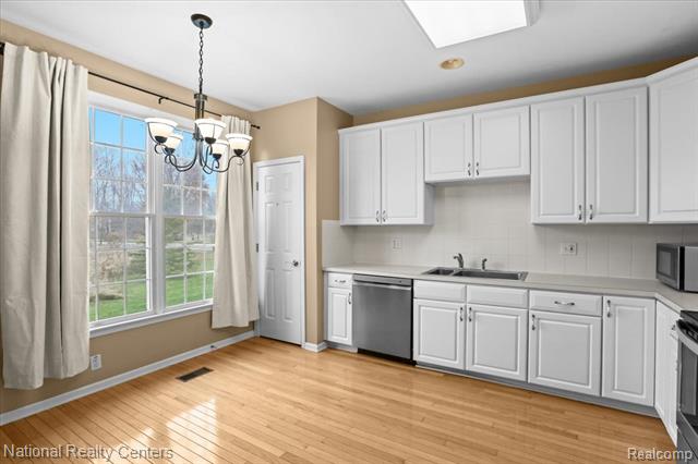 Builiding view ten for 49944 Blackberry, Novi, MI. 48374