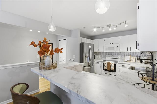 Builiding view four for 28211 Oakmonte E, New Hudson, MI. 48165