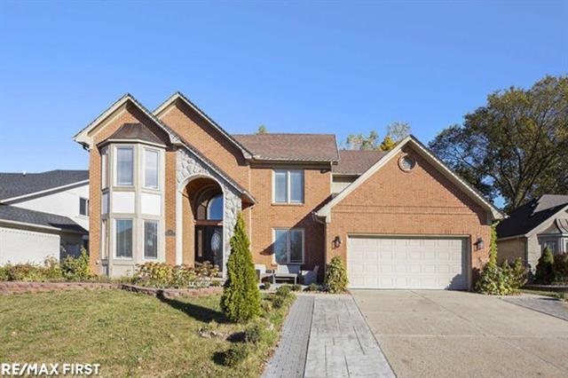 Builiding view one for 18765 Riverside Glen, Macomb, MI. 48044