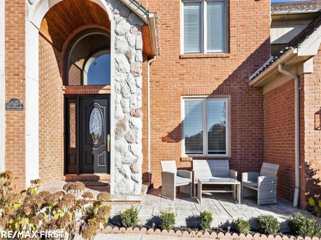 Builiding view two for 18765 Riverside Glen, Macomb, MI. 48044