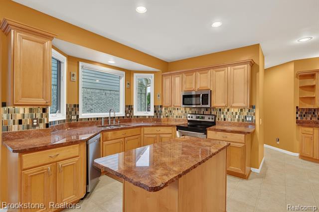 Builiding view twelve for 47749 Dennis Baert D, Macomb, MI. 48044