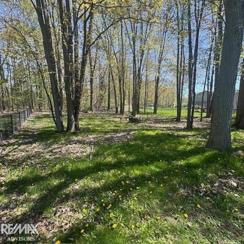 Builiding view thirty three for 54690 Beacon Cove Ci, New Baltimore, MI. 48047