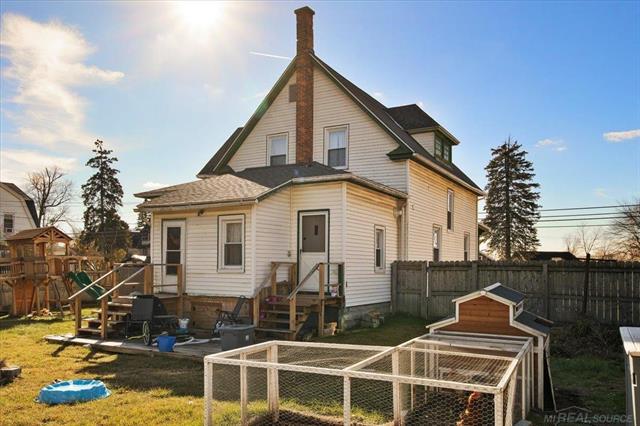 Builiding view eighteen for 58910 Main, New Haven, MI. 48048