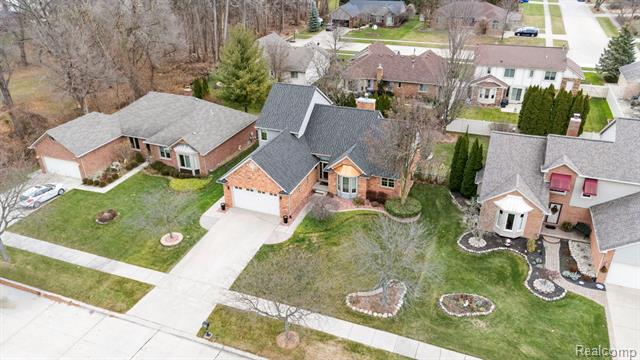 Builiding view fifty two for 40312 Sugar Spring D, Sterling Heights, MI. 48313