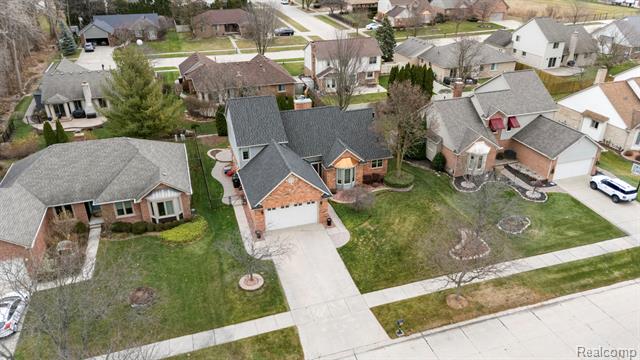 Builiding view fifty for 40312 Sugar Spring D, Sterling Heights, MI. 48313