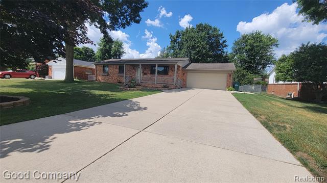 Builiding view one for 46075 Hecker, Utica, MI. 48317