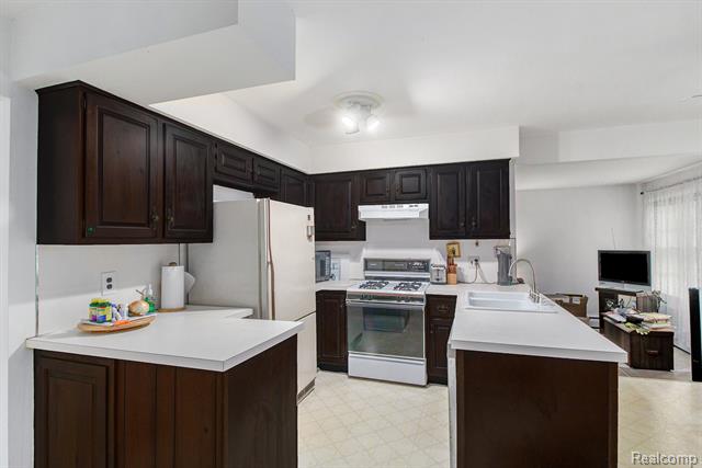 Builiding view three for 6525 Little Turkey R, Utica, MI. 48317