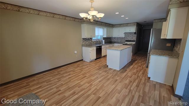 Builiding view three for 11027 Russell, Utica, MI. 48317