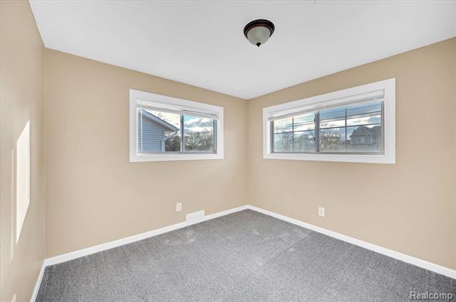 Builiding view nine for 8365 21 Mile, Utica, MI. 48317