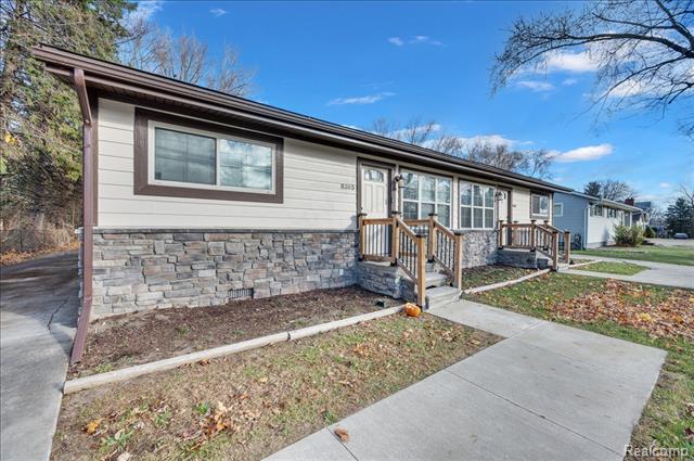 Builiding view two for 8365 21 Mile, Utica, MI. 48317