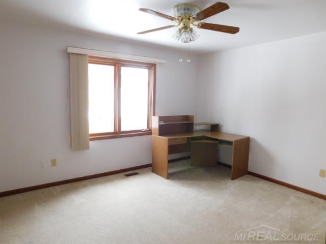 Builiding view eighteen for 48515 Hidden Oaks, Utica, MI. 48317