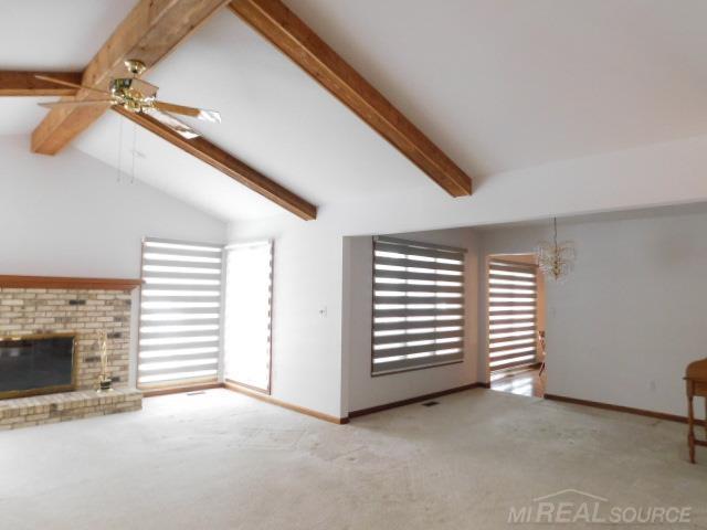 Builiding view five for 48515 Hidden Oaks, Utica, MI. 48317