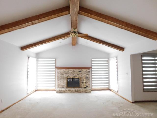 Builiding view four for 48515 Hidden Oaks, Utica, MI. 48317