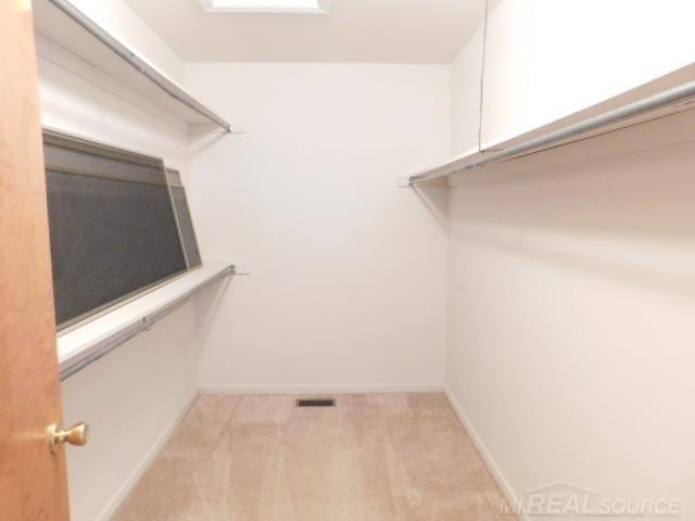 Builiding view fourteen for 48515 Hidden Oaks, Utica, MI. 48317